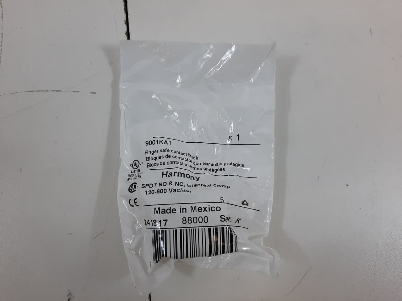 Schneider Electric 9001KA1 Schneider Electric 9001KA1 is a contacts block designed with a contact block featuring direct-acting contacts, including 1 Normally Open (NO) auxiliary contact and 1 Normally Closed (NC) contact. It is rated for IP66 and complies with NEMA ratings 1, 2, 3, 3R, 4, 12, and 13, ensuring a wide range of environmental protection. The net height of the contacts block is specified at 2.5 kV, with a power consumption characterized as clear. It has a response time associated with 1 NC contact and is designed for a diameter of 600 V. The network frequency is identified as 9001K. This product is replaced by a version with contacts made of Silver alloy (Ag / Ni) to ensure durability and conductivity. The trip unit type is a screw-clamp mechanism, and the earthing system supports an (Ith) of 10 A. For control circuits, it is rated at AC-15 3 A for 240Vac and DC-13 0.55 A for 125Vdc. The weight of the part is specified. 9001KA1 on Powermatic Associates